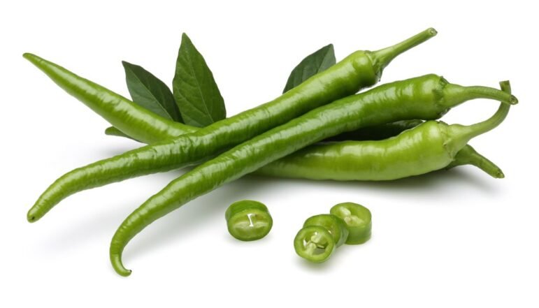 Green chillies isolated on white background.